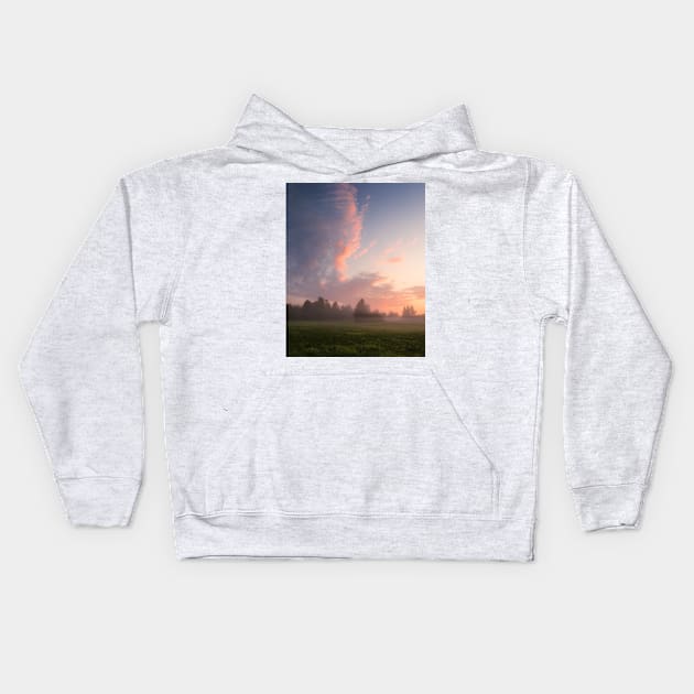 Misty meadow sunrise landscape Kids Hoodie by Juhku